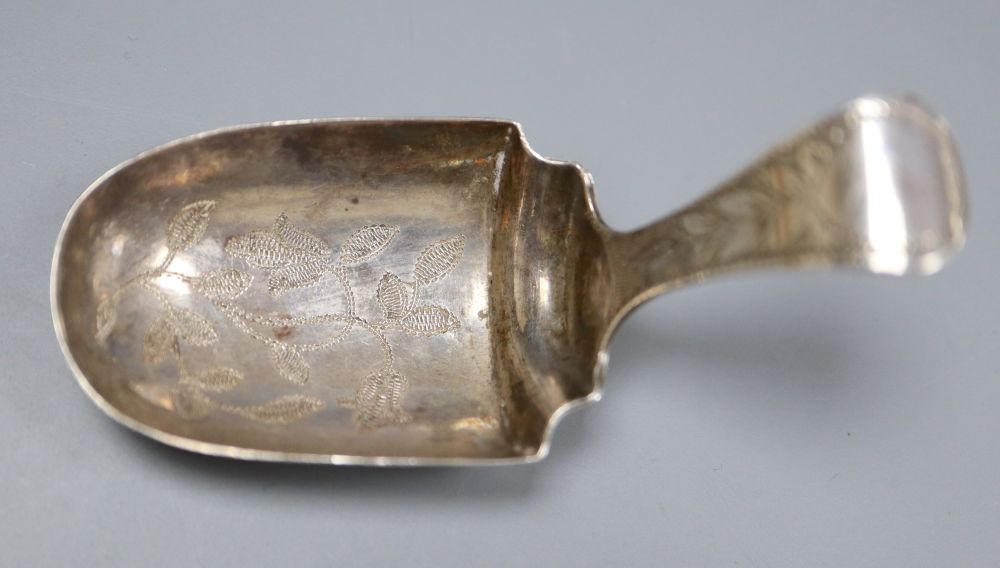 A George III silver marrow scoop, William Bateman I, London 1818, a George IV scoop, London 1824 and a George III silver caddy spoon